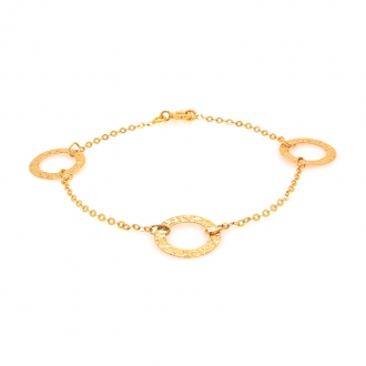 Bracelet en or jaune 750/000 triple cercles CARADOR