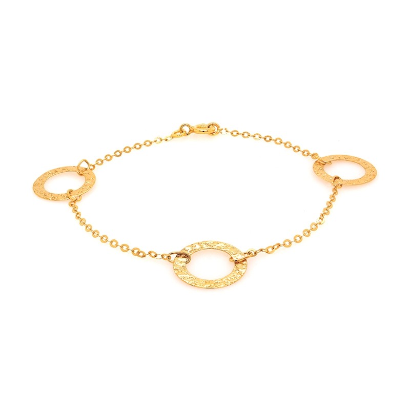 Bracelet en or jaune 750/000 triple cercles CARADOR