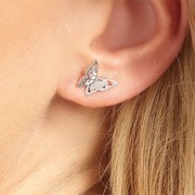 Boucles d'oreilles acier rhodié "Fly away" Boucles d'oreilles acier rhodié "Fly away"