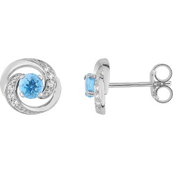 Boucles d'oreilles clous en or blanc 375/000 et topaze