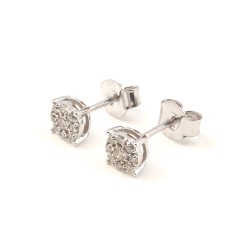 BOUCLES D'OREILLES CLOUS CARADOR EN OR BLANC 375/000 ET DIAMANT 0.17 CARAT