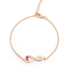 Bracelet fantaisie femme carador en plaqué or avec oxydes de zirconium et spinelle rouge motif signe infini