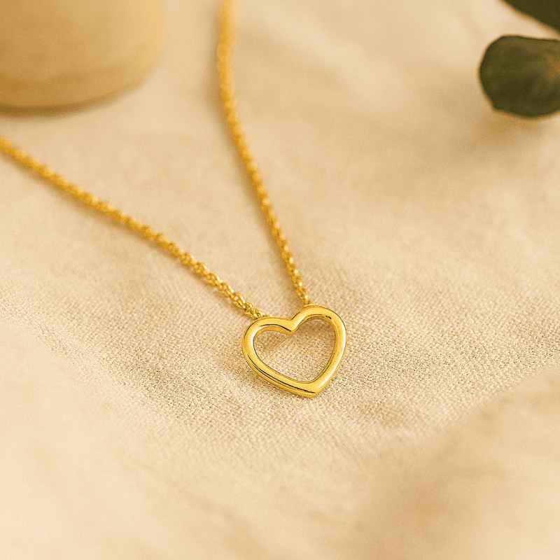 Collier fantaisie Carador en  or jaune 750/000 motif cœur ajouré
