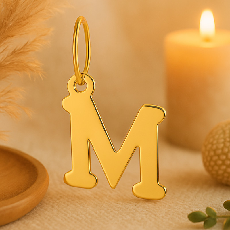 Pendentif initiale M en or jaune 750/000