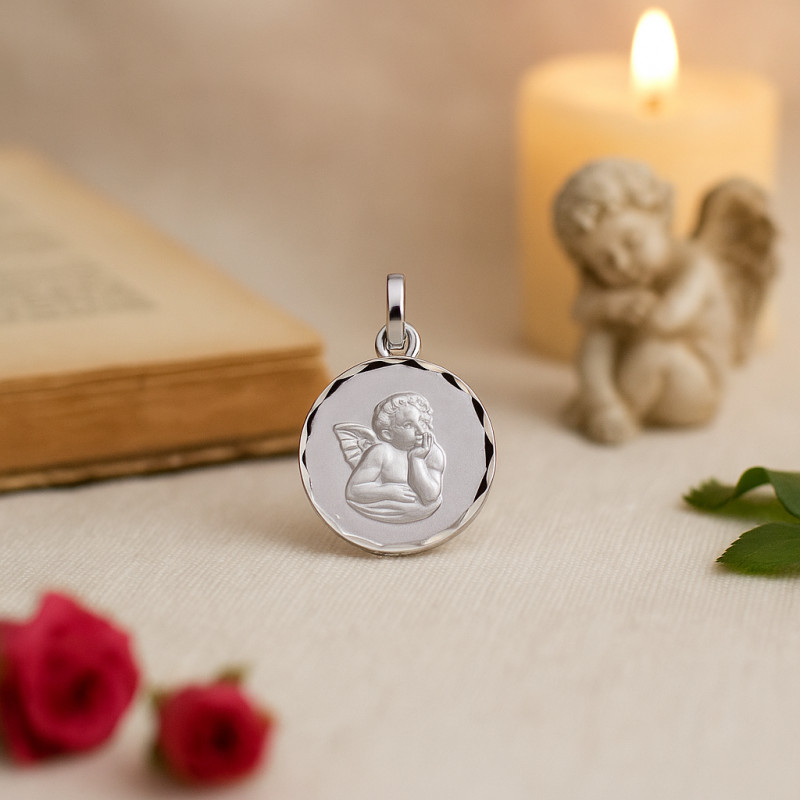 Médaille religieuse ronde Carador  ange  en or blanc 750/000