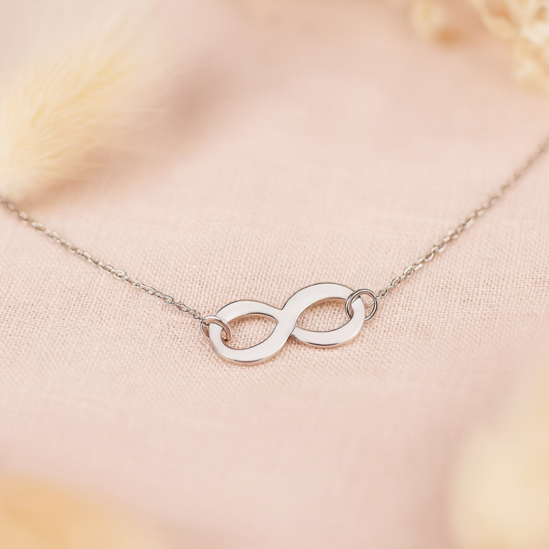 Collier INFINI en or blanc 750/000 CARADOR
