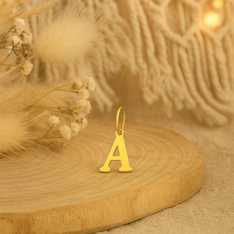 Pendentif lettre A en or jaune 750/000 CARADOR