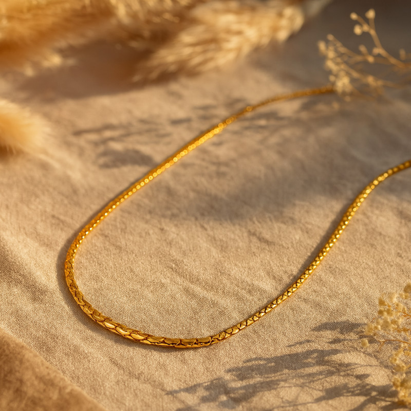 Collier CARADOR maille haricot en or jaune 18 CARATS