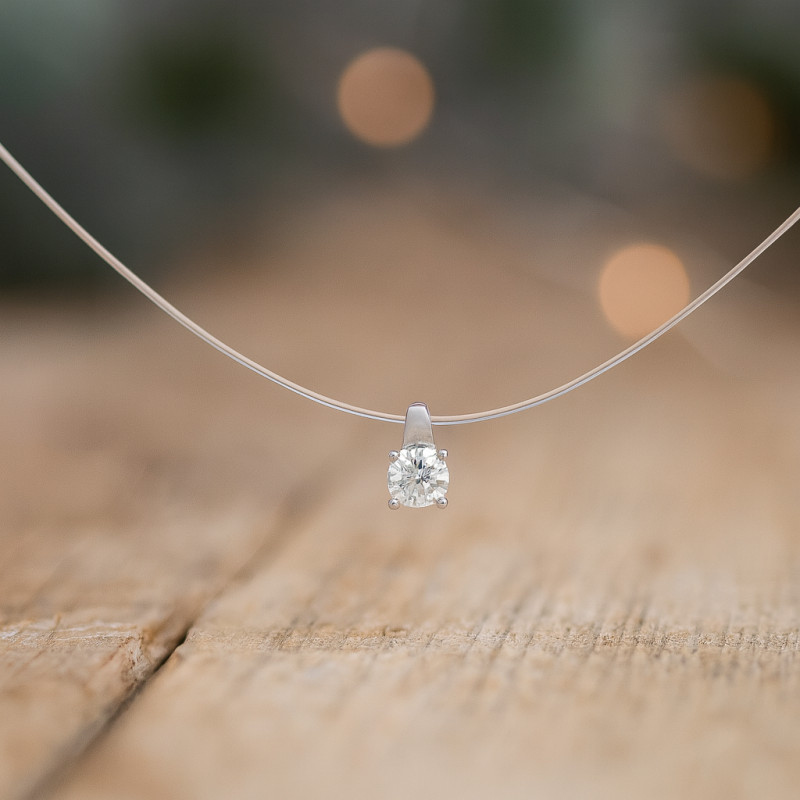 Collier en nylon et oxyde de zirconium de chez CARADOR or blanc 750/000