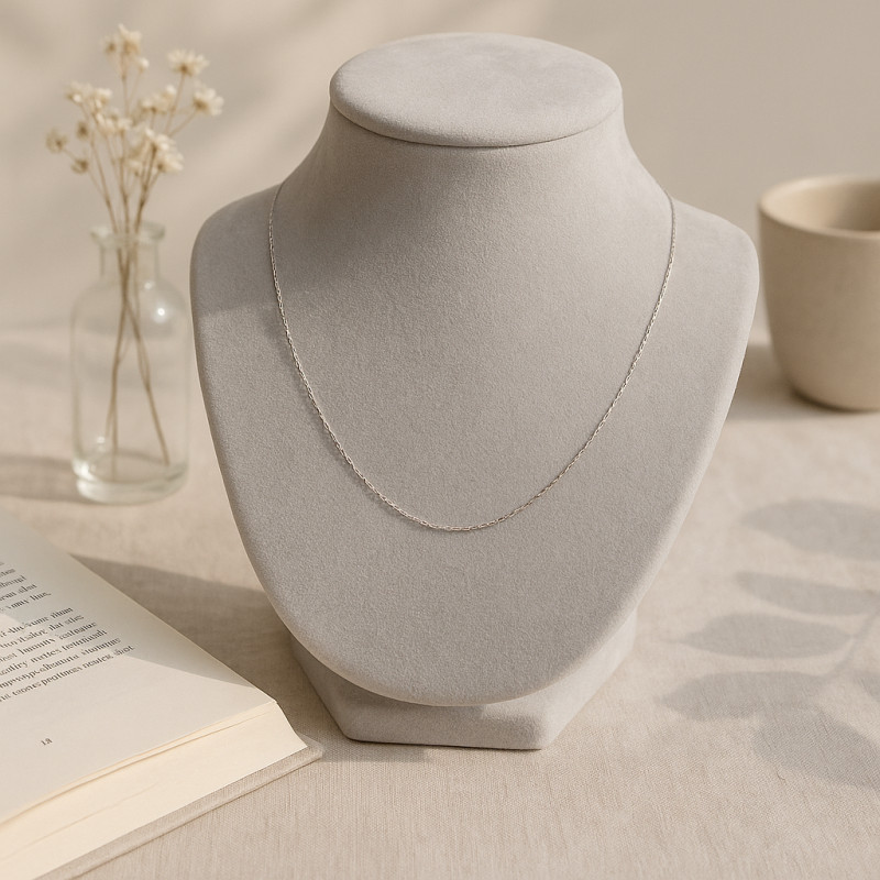 Chaîne CARADOR maille forçat or blanc 750/000