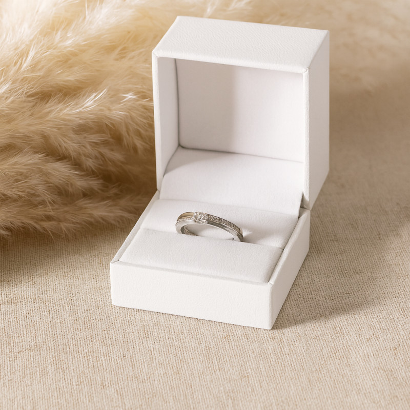 Bague solitaire accompagné Carador en or blanc  750/000 et Diamants