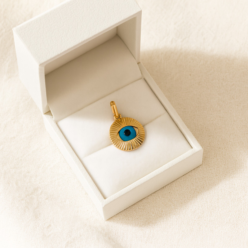 Pendentif ronde Carador oeil grec en or 750/000