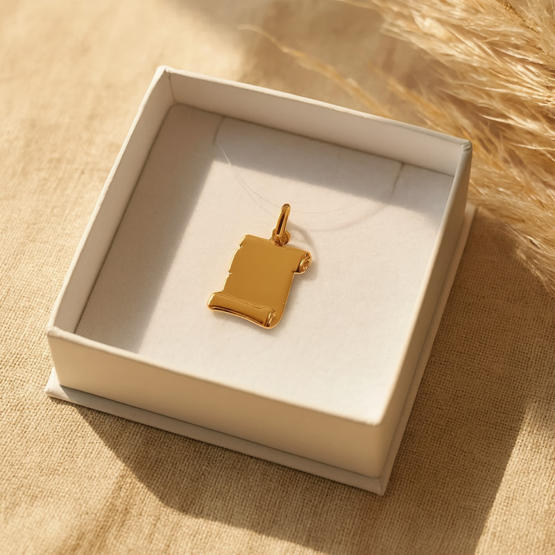 Pendentif parchemin Carador or jaune 750/000