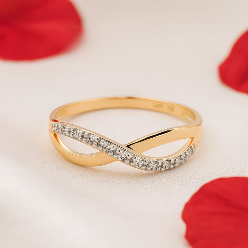 Bague fantaisie femme carador en or jaune 750/000 et oxydes de zirconium motif signe infini