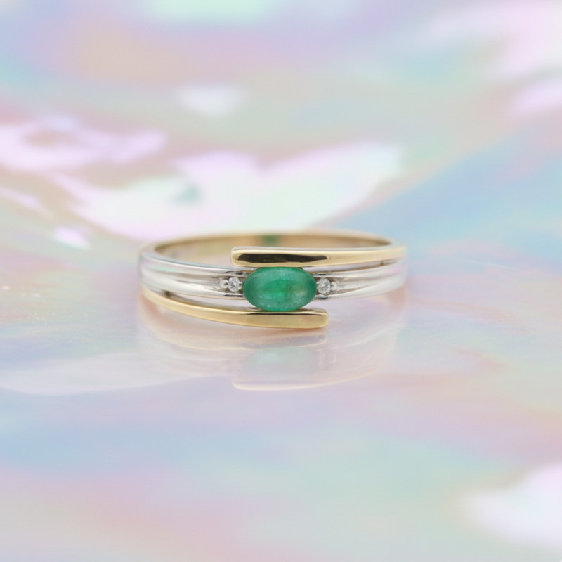 Bague Carador or jaune et blanc 375/000 et émeraude