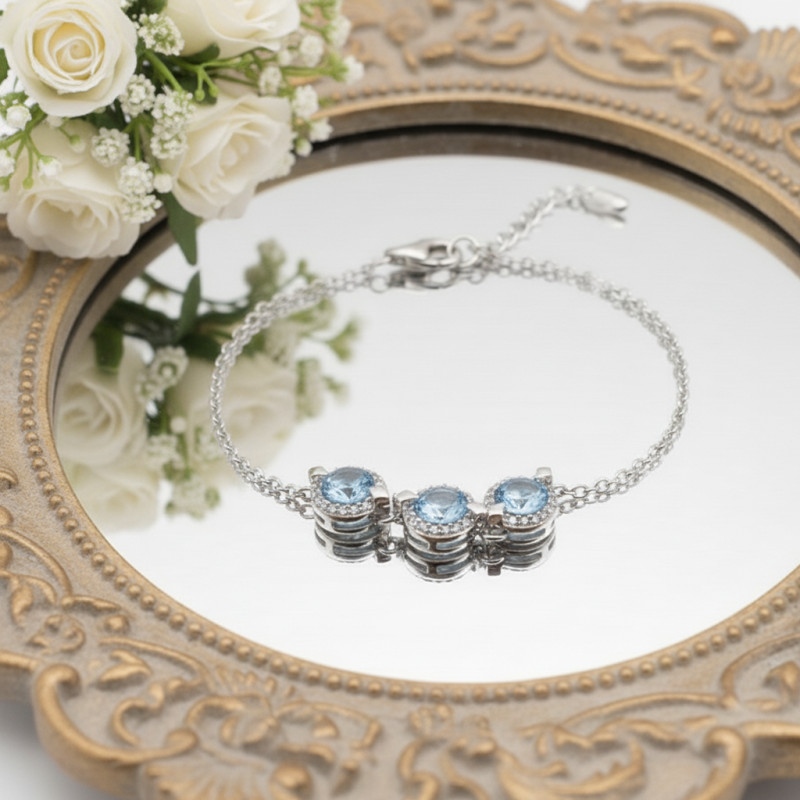 Bracelet femme fantaisie Carador en argent  et 3 spinelles bleu clair serti clos