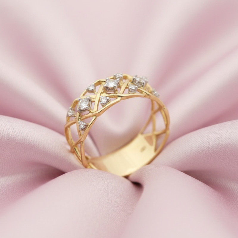 Bague résille Carador en or jaune 750/000 et diamants