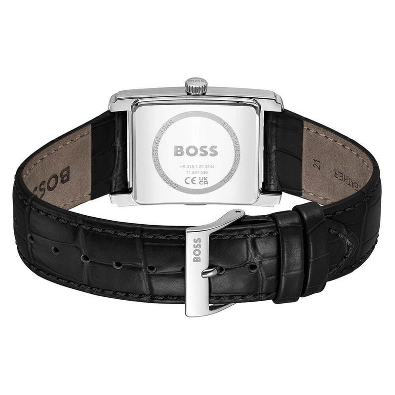 Gros plan sur le boîtier et le cadran de la montre BOSS Principle Dress avec chiffres romains et gui