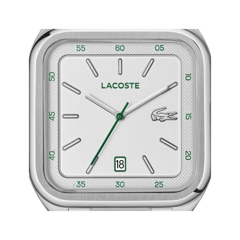 Gros plan sur le cadran de la Lacoste 2093605 : chiffres arabes verts, rehaut petit piqué et logo cr