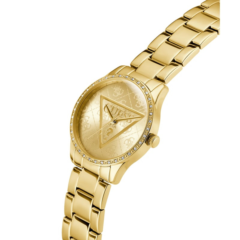 Gros plan sur le cadran champagne de la montre GUESS Roxy avec triangle GUESS et motif G
