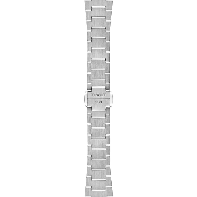 Gros plan sur la Montre Analogique TISSOT Collection PRX bracelet acier gris