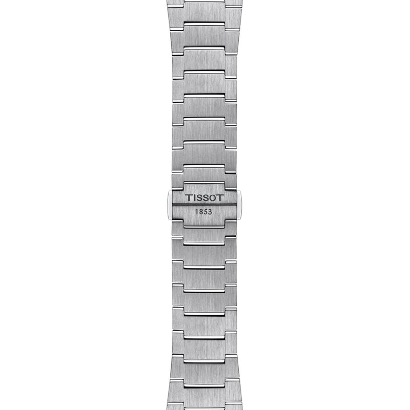 Gros plan sur la Montre Automatique TISSOT Collection PRX bracelet acier gris, cadran bleu glacier t
