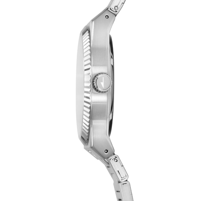 Profil latéral de la montre Lotus avec boîtier acier fin de 9,7 mm, lunette cannelée et couronne sig