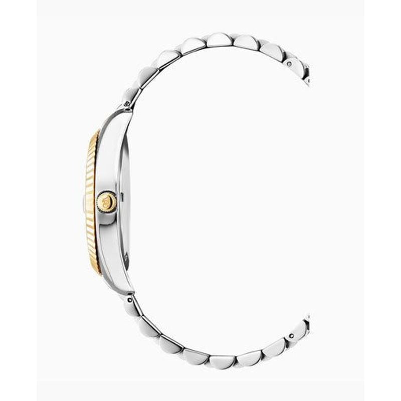 Profil de la montre Jacques Du Manoir Inspiration, lunette dorée cannelée et boîtier fin