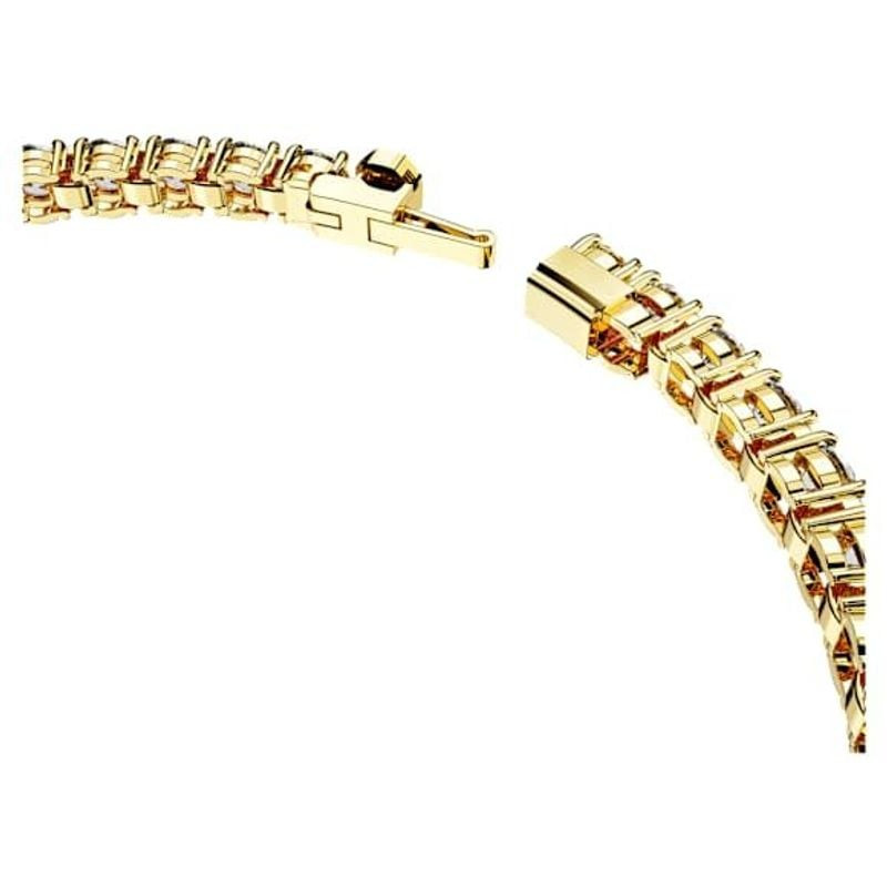 Vue détail du bracelet tennis Matrix Swarovski doré blanc aux cristaux blancs et monture plaquée or.