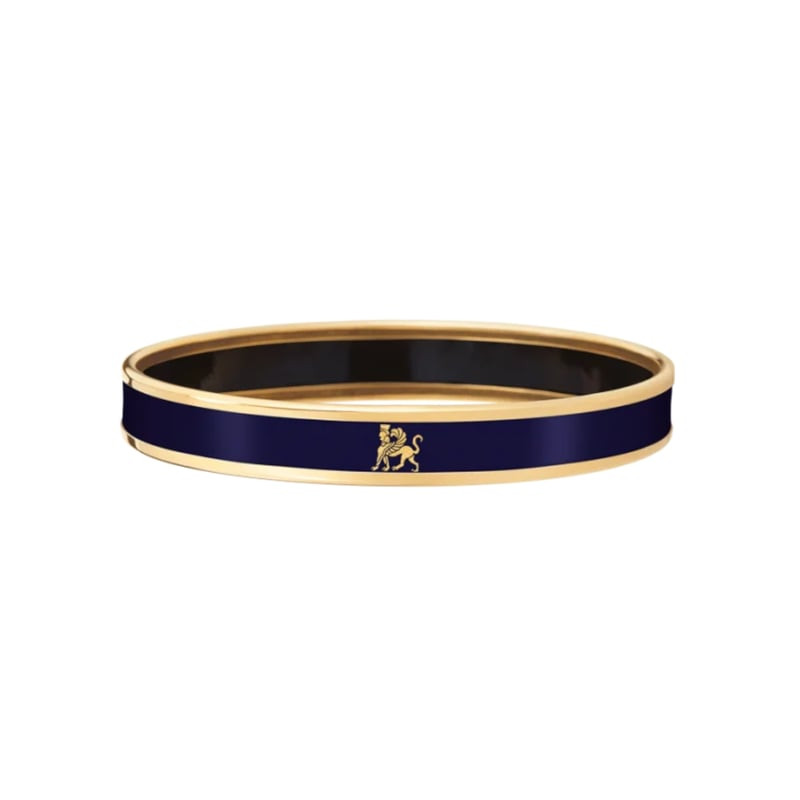 Bracelet FREY WILLE MMY Monochrome Mademoiselle en or jaune avec émail bleu marine sur fond blanc.