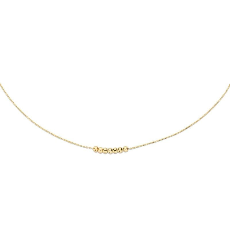 Collier Jackie 585 Milliemes Mini Billes Doré en or jaune 14 carats, packshot sur fond blanc