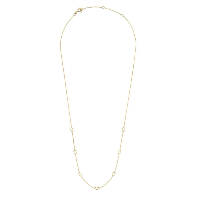 Vue complète du collier long Jackie Gold en or jaune 14 carats à maillons ovales espacés, posé à pla