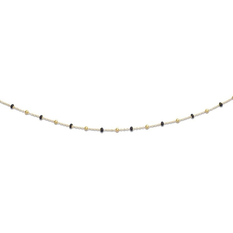 Collier chaîne 45 cm en or jaune 18 carats, boules noires laquées brillantes alternant avec des perl
