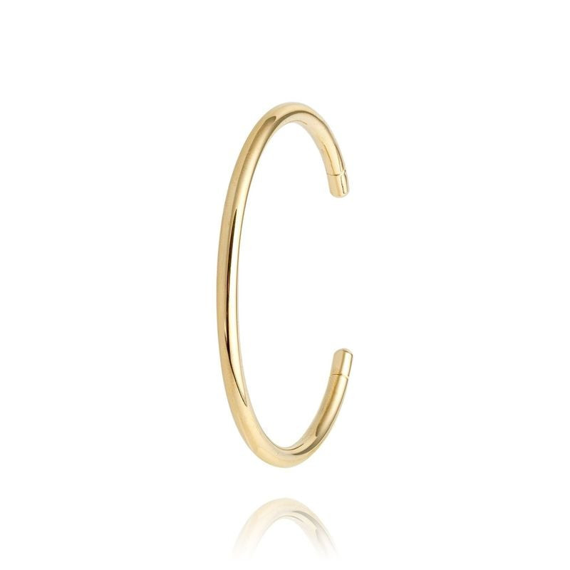 Bracelet jonc ouvert doré Louise's Garden présenté sur fond blanc