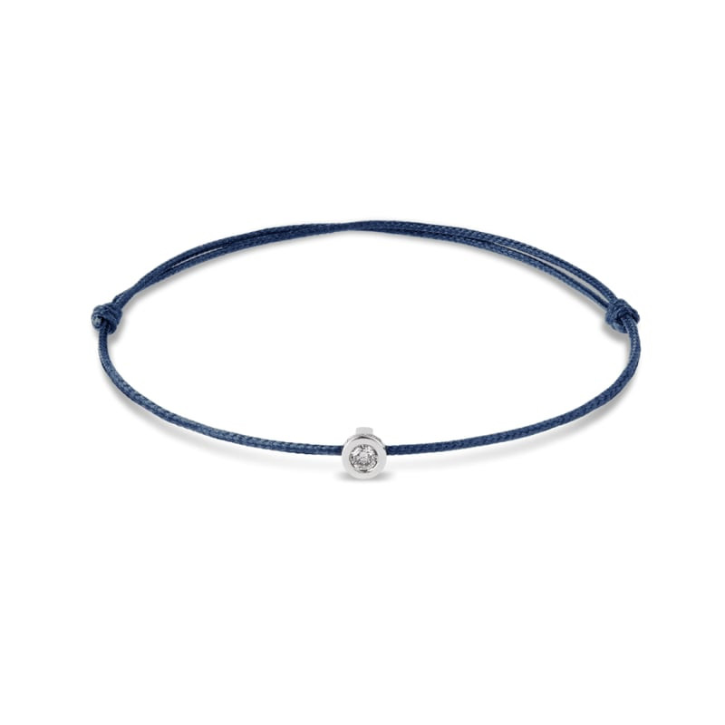 Bracelet cordon bleu Mauboussin avec charme rond en or blanc serti d'un diamant de 0,05 carat, nœuds