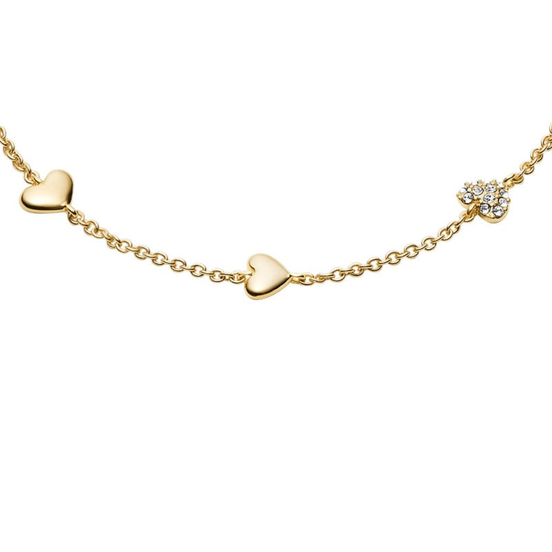 Détail du Bracelet Heartbeat FOSSIL laiton doré cristaux : cœurs et cristaux pavés scintillants.