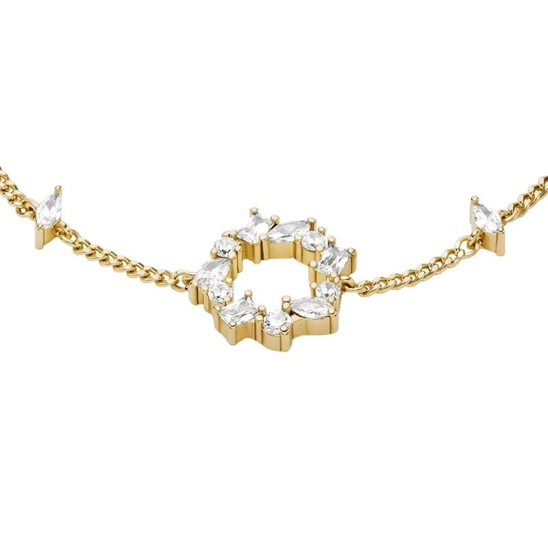 Gros plan sur le bracelet pampilles FOSSIL Ellis en laiton doré avec zircons cubiques.