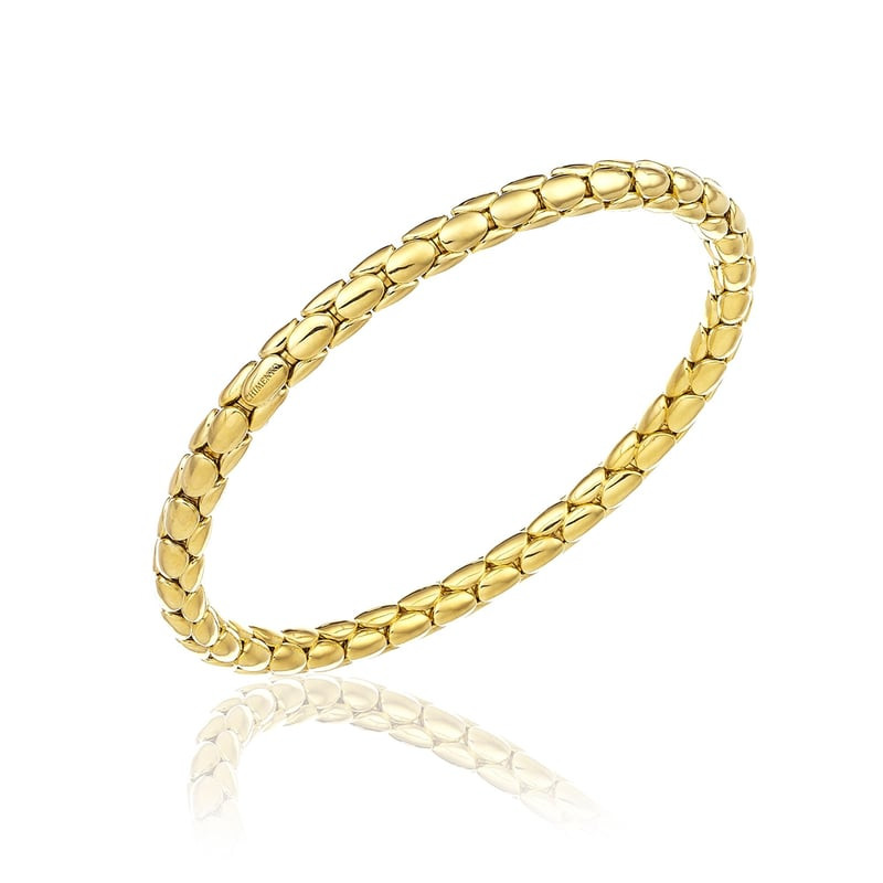 Bracelet rigide Chimento Stretch Spring en or jaune 18 carats poli, maillons ovales courbés, sur fon