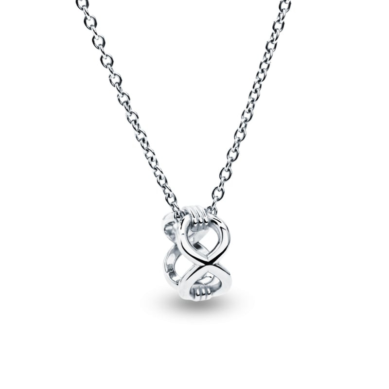 Pendentif Mauboussin 1955 Vouloir et Oser en argent 925 rhodié avec anneaux infinis entrelacés sur c
