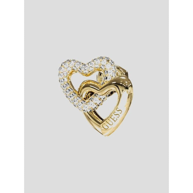 Gros plan sur la boucle d'oreille Guess Beloved dorée : un cœur pavé de cristaux chevauchant un cœur