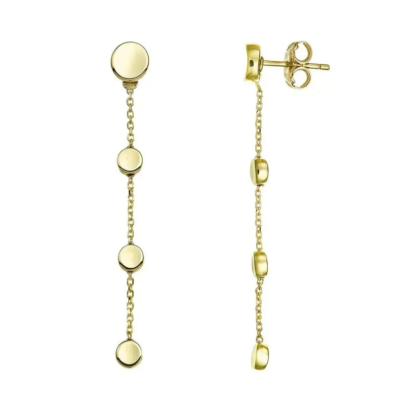Gros plan des boucles d'oreilles Chimento Armillas Glow : disques d'or poli, maillons de chaîne et f