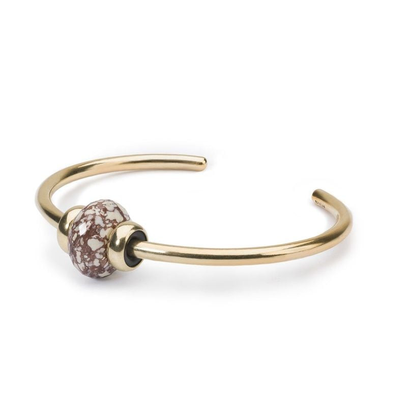 Perle de Bracelet Trollbeads Aile d'Ange Alunite dans une ambiance naturelle et apaisante, mettant e