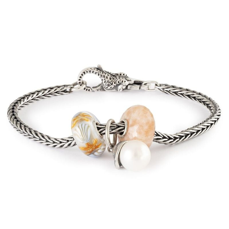 Perle TROLLBEADS Compagnons de l'Océan sur un bracelet en argent avec d'autres perles