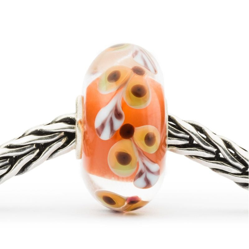 Perle Trollbeads Joyeux Grimpeur en verre sur une chaîne en argent, motif floral orange et noyau en 