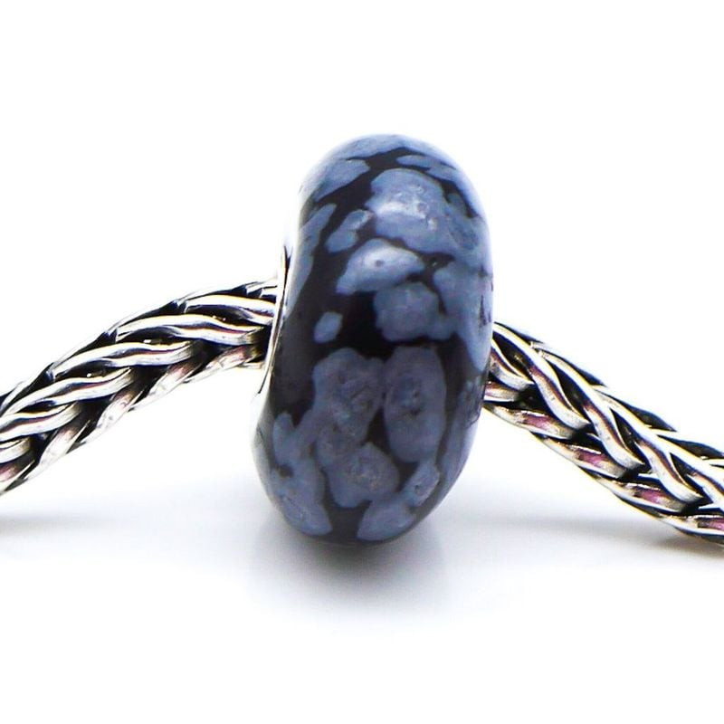 Perle de Charme Trollbeads Flocon Obsidienne Noir, pierre volcanique aux motifs blancs naturels