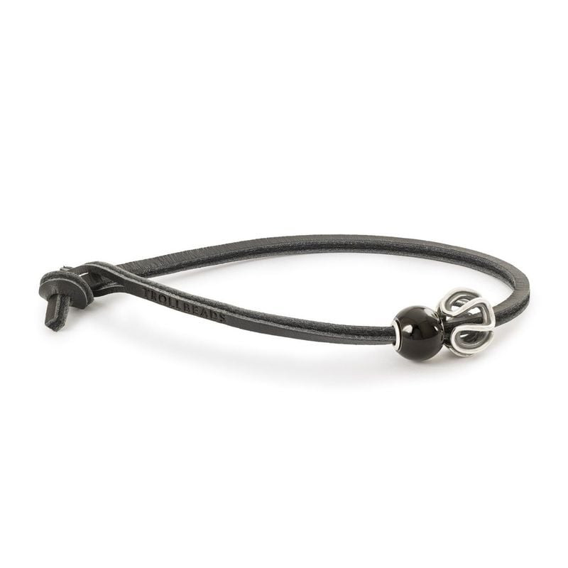 Bracelet Trollbeads en cuir noir avec une perle noire brillante et une perle spirale argentée, logo 