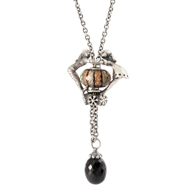 Perle Trollbeads Plaisirs d'Hiver montée sur pendentif flocon de neige en argent avec goutte d'onyx 