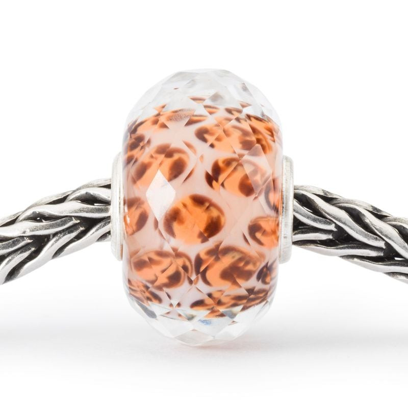 Packshot de la Perle Trollbeads Taches de Léopard Verre Multicolore, perle artisanale en verre à fac