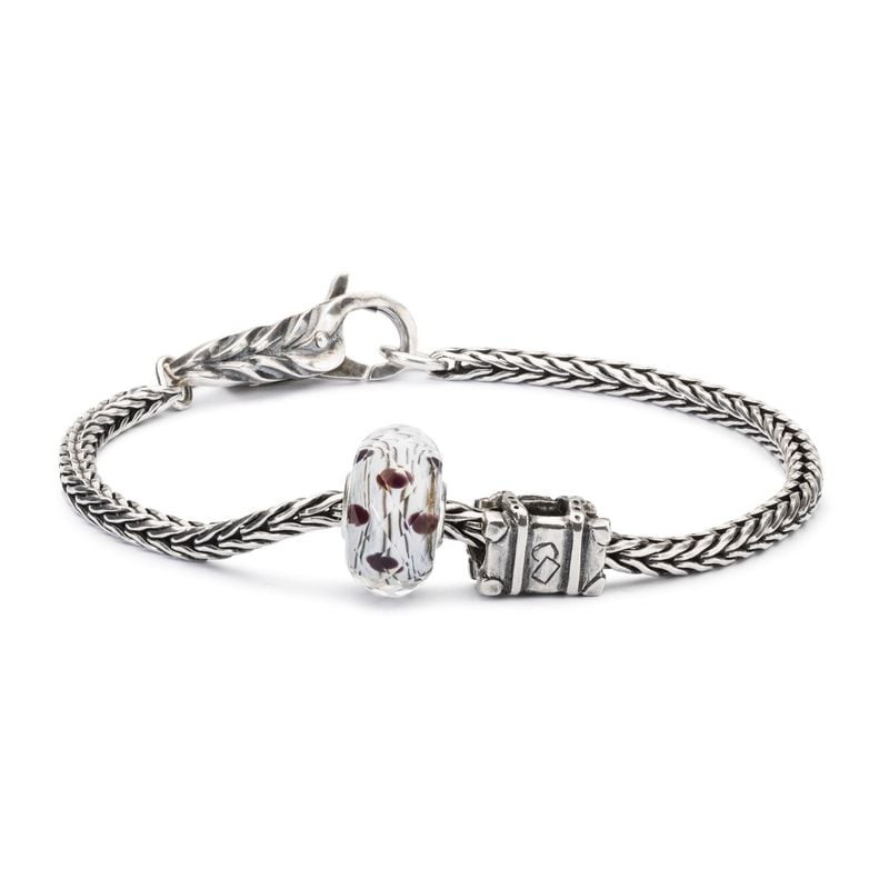 Perle Trollbeads Rêves polaires en verre bleu et blanc, éclat argenté, ambiance polaire hivernale