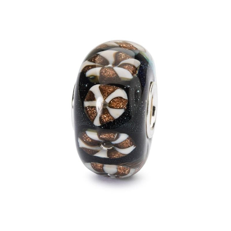 Perle en verre Trollbeads Golden Ornaments, base sombre scintillante et motifs dorés et blancs sur f